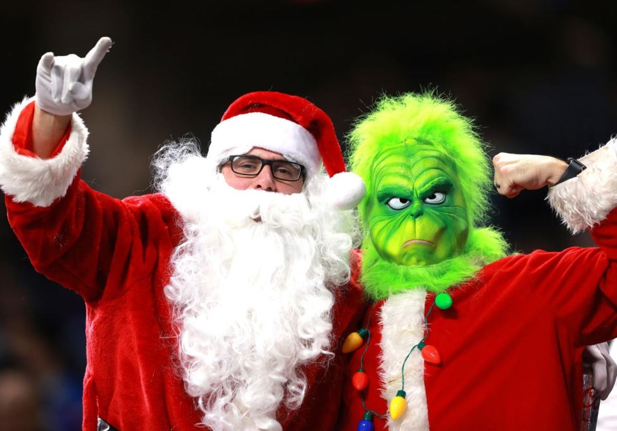 Grinch truck delivers holiday cheer and hope to the QCA 