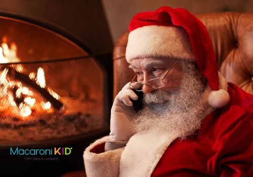 Serious Santa on phone Canva