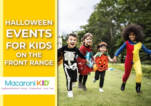 children in halloween costumes running outside