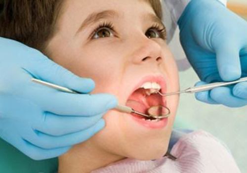 Child with Dental Hygienist