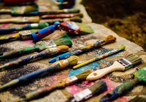 Art paintbrushes in an artist studio