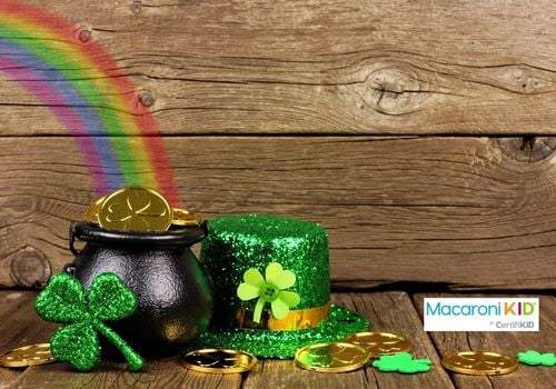 St Patricks Day Pot of Gold with rainbow & decor against wood