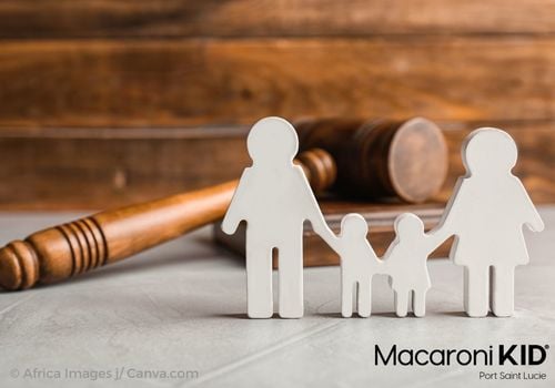 Cutout of family in front of gavel