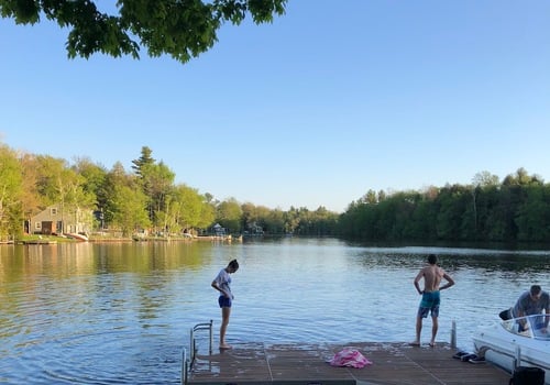 teens; kids; swim; boat; lake