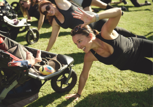 Moms exercising with babies looking