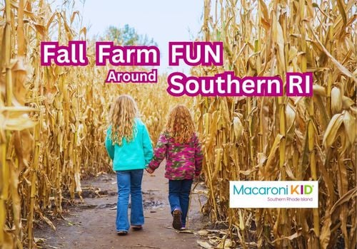 Two children walking into a corn maze