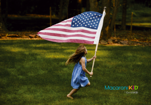 Girl running with american flag