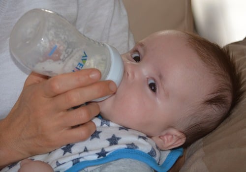 Baby Drinking a Bottle