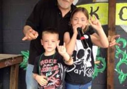 Frank Aluotto BFE Rock Club with kids at Rock Out 4 Kids Toy Drive and Show