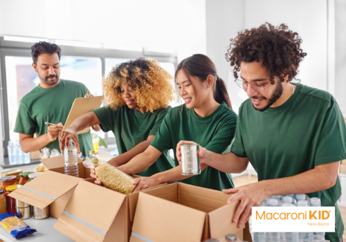 Happy Volunteers Packing Food in Donation Boxes