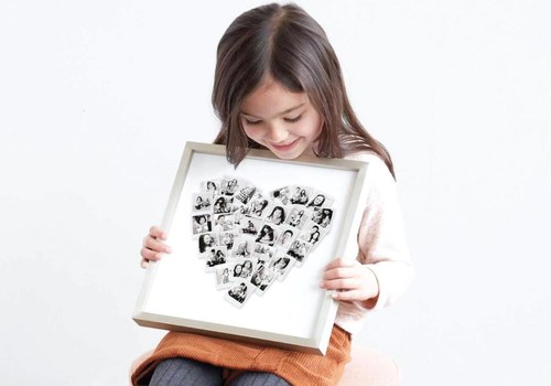 Girl holding picture from Minted, certifikid deals