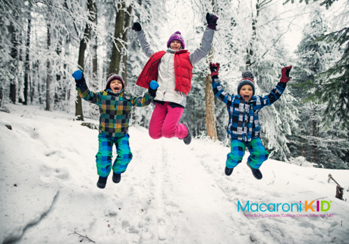 Kids jumping in the snow