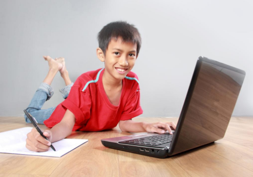 boy learning on computer