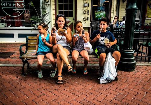 A family eating ice cream outside