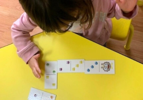 Child Playing A Game
