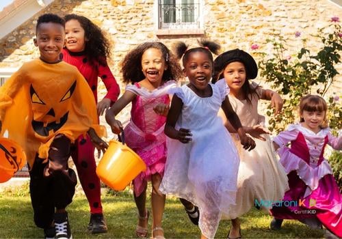 Running Children in Halloween Costumes