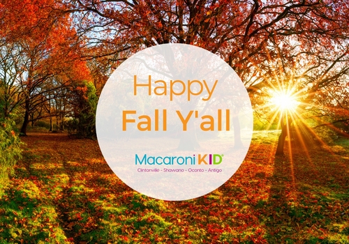 A fall scene with changing colors and a sunset with a white circle with the words Happy Fall Y'all written inside