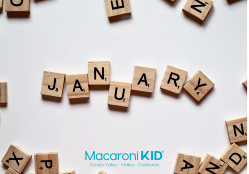Wooden scrabble tiles arranged to spell January