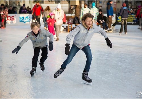two boys ice skating