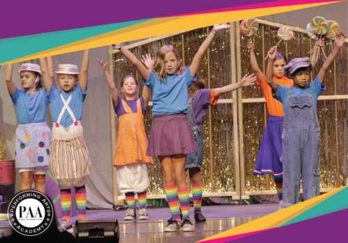 children performing willie wonka and the chocolate factory on stage