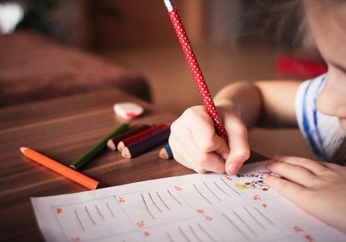 Child Working on Worksheet