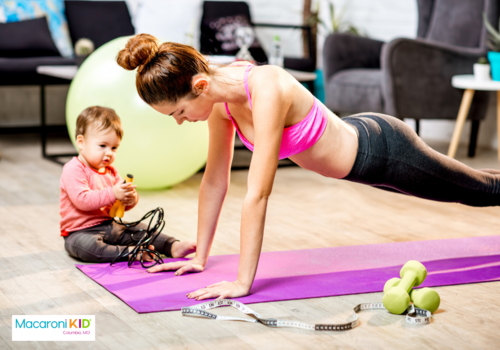 mother exercising with her baby
