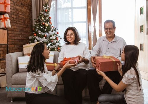 Asian Family Exchanging Gifts