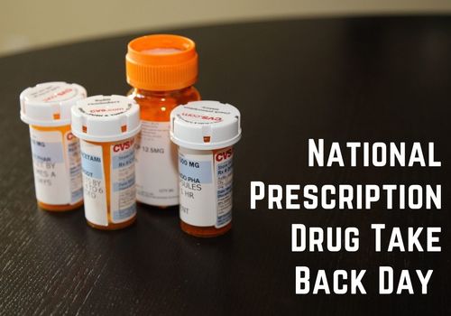 Prescription bottles. Text on image National Prescription Drug Take Back Day