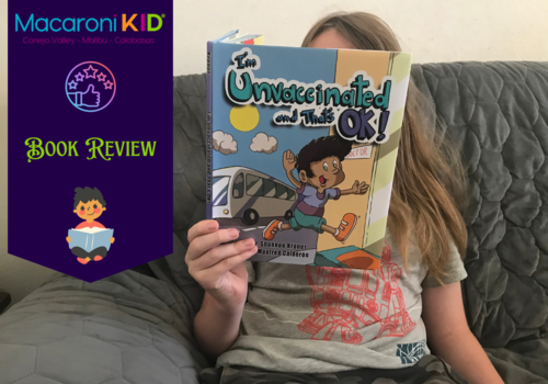 Macaroni KID Conejo Valley - Malibu - Calabasas Book Review: I'm Unvaccinated and That's OK! A photo of a boy holding up and reading the book.