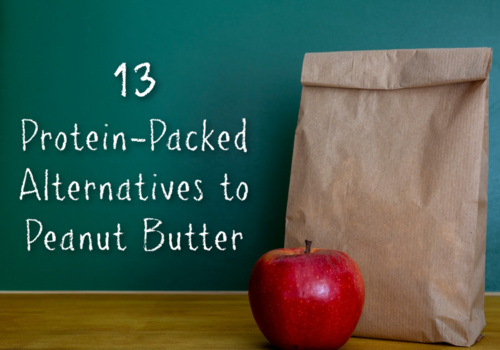 sack lunch and apple in front of a chalkboard with text that says 13 protein-packed alternatives to peanut butter