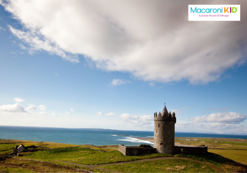 Photo of a stone castle overlooking the sea