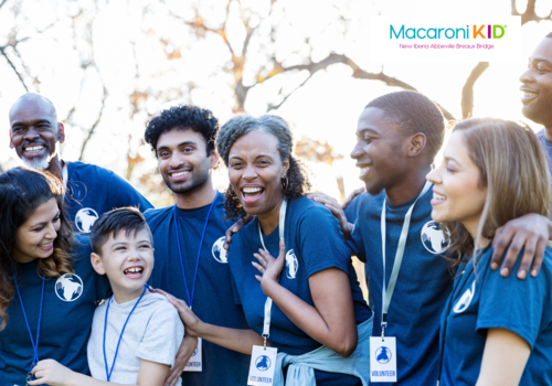 Diverse Group of volunteers in blue tshirts