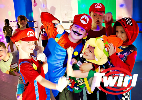 Twirl dance students in Mario costumes