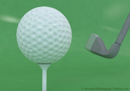 Golf ball and club