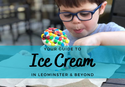 Young child eating a dish of vanilla ice cream with mini M&Ms on top. Text: Your guide to ice cream in leominster and beyond