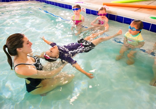 swim instructor and students