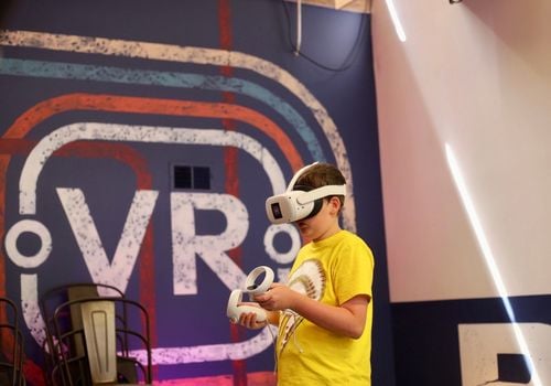 Kid playing virtual reality