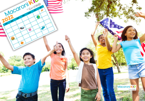 kids wave American flags
