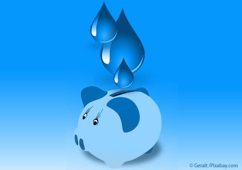 Water drops going into piggy bank