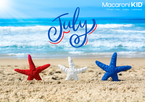 July - Red, white and blue starfish on the beach