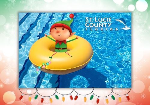 Elf on a float in a pool