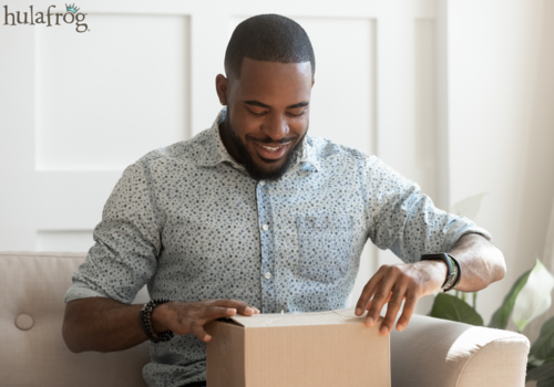 african american man opening a present