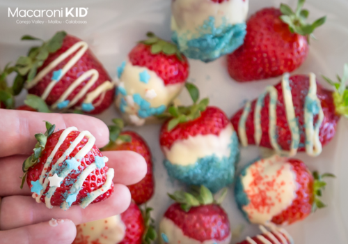 patriotic strawberries, decorated with white chocolate and blue sprinkles