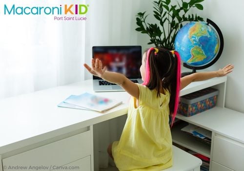 Child learning at home on a laptop computer