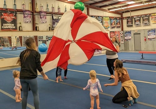 Kids playing with parachute at gymnastics in Roanoke vA