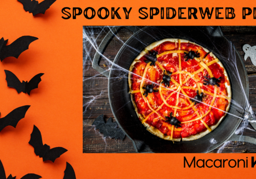 pizza of a spooky spiderweb pizza with black olives as the spiders