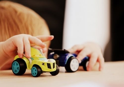 Toddler playing with Trucks