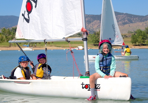 children on a boat at Community Sailing of Colorado Summer Camp