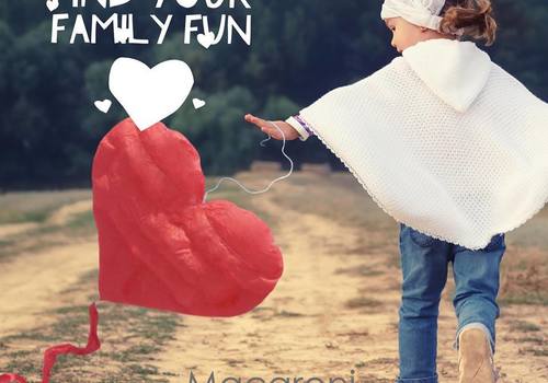 Girl running with heart kite