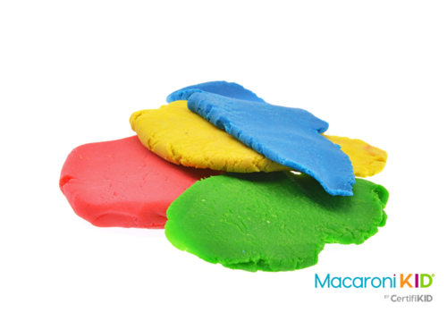 colorful play doughs on white background